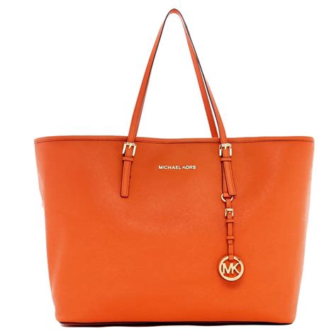 michael kors burnt ornage large jet set tote|michael kors jet set luggage.